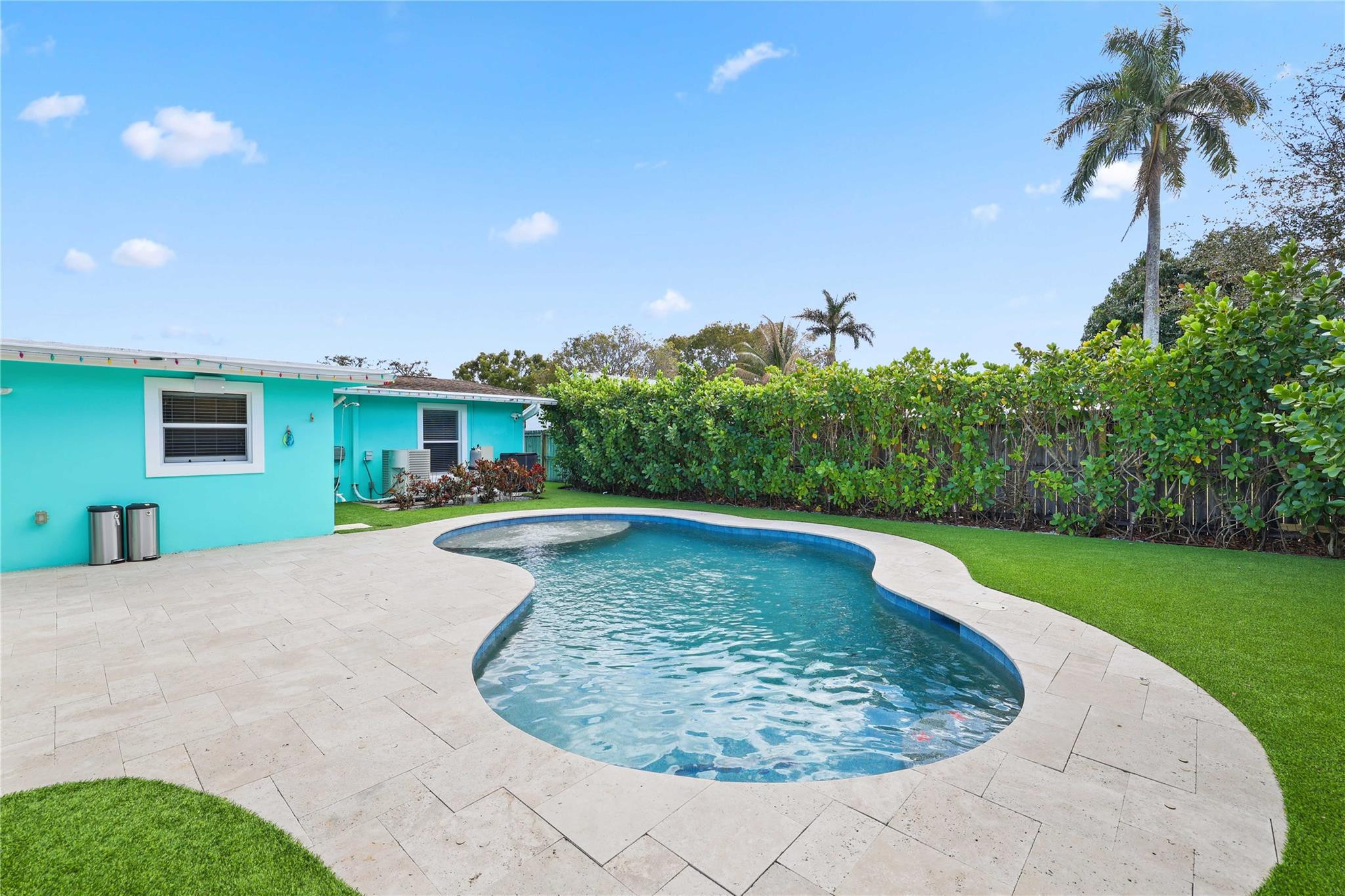 413 Philadelphia Drive Jupiter, FL 33458 - Photo 22 of 35 a view of a swimming pool with a yard