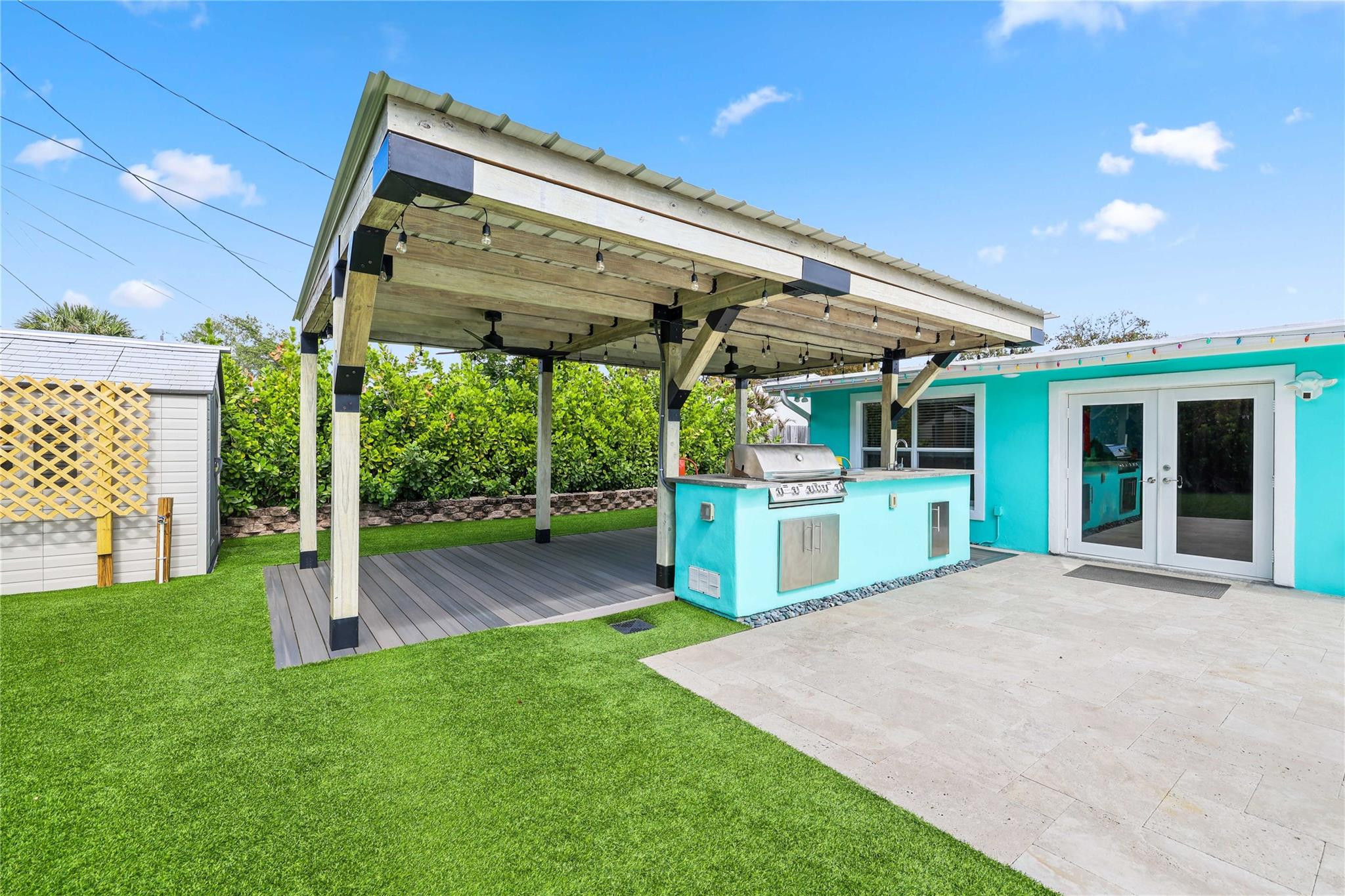 413 Philadelphia Drive Jupiter, FL 33458 - Photo 25 of 35 a view of a house with backyard and porch