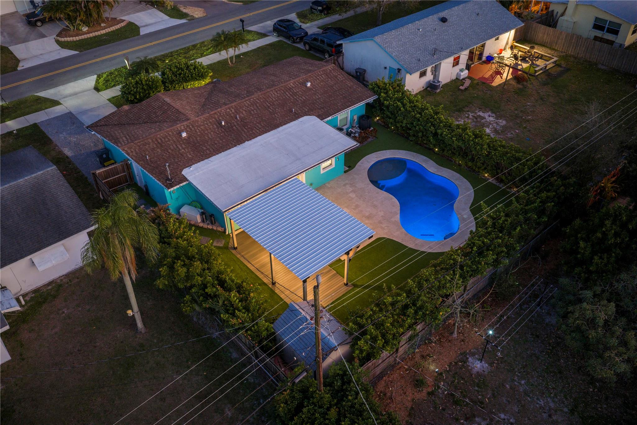 413 Philadelphia Drive Jupiter, FL 33458 - Photo 31 of 35 an aerial view of a house with yard swimming pool and outdoor seating