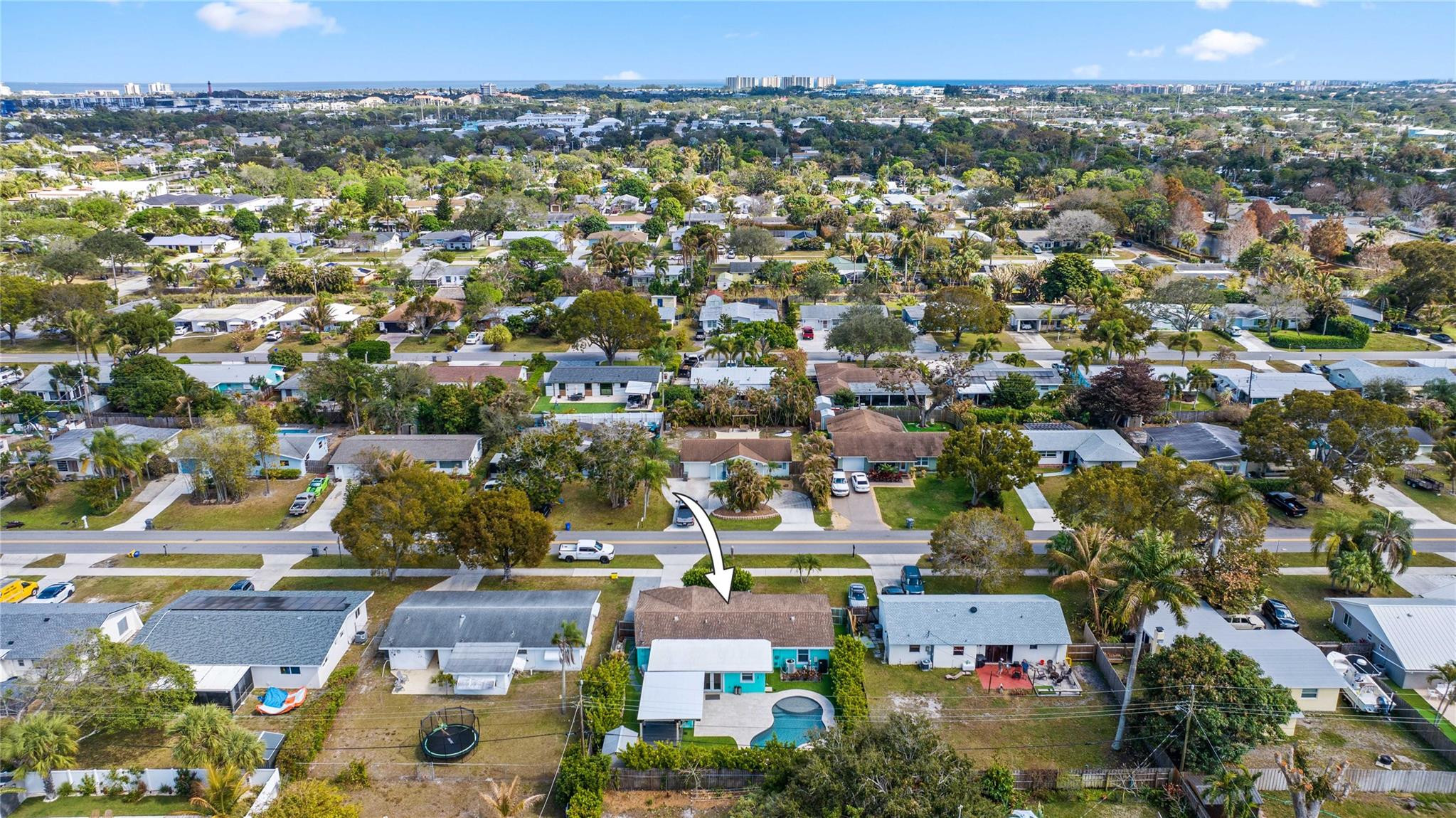 413 Philadelphia Drive Jupiter, FL 33458 - Photo 33 of 35 an aerial view of residential houses with outdoor space
