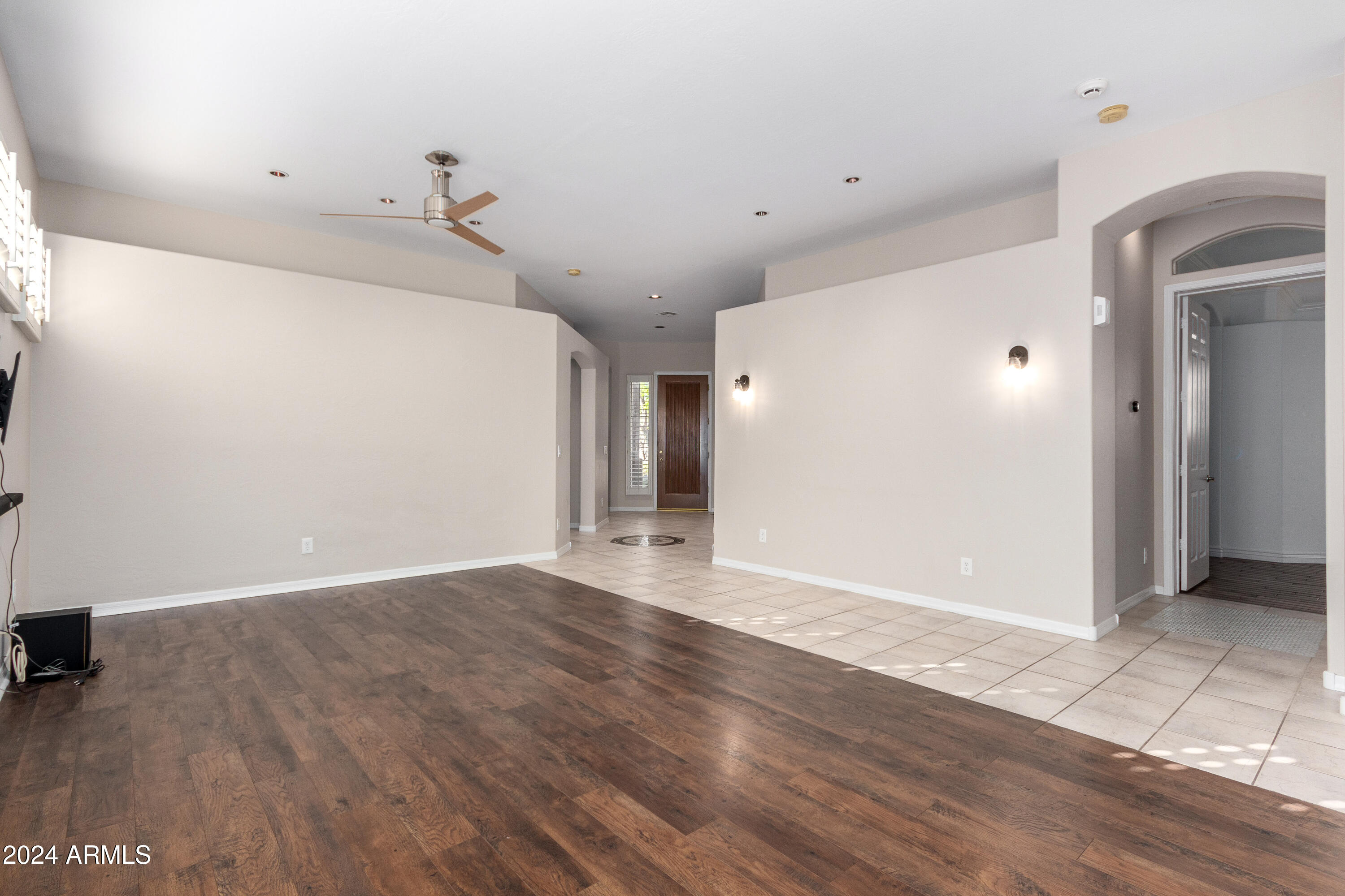 5246 East Estevan Road Phoenix, AZ 85054 - Photo 6 of 40 Living and Dining Room with vinyl plank