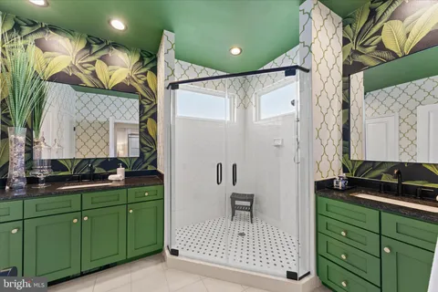 a bathroom with a sink a mirror and vanity