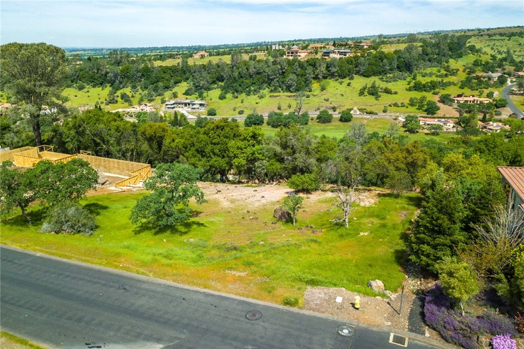 a view of a yard with an outdoor seating