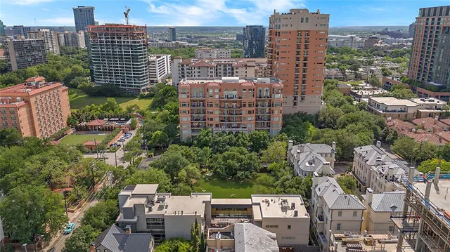 a view of a city with tall buildings
