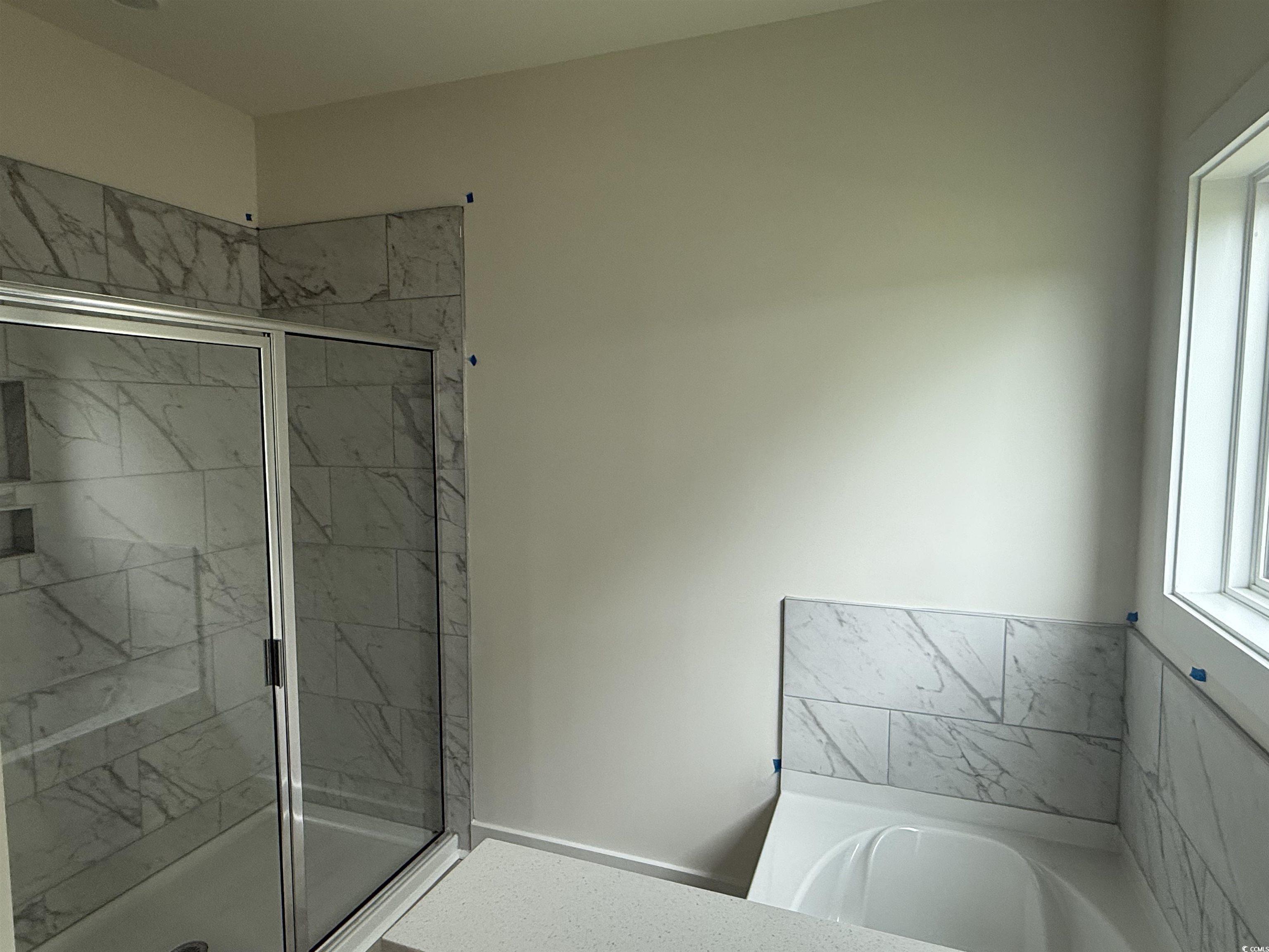 1045 Jase Drive Longs, SC 29568 - Photo 16 of 33 Full bath with a shower stall and a bath