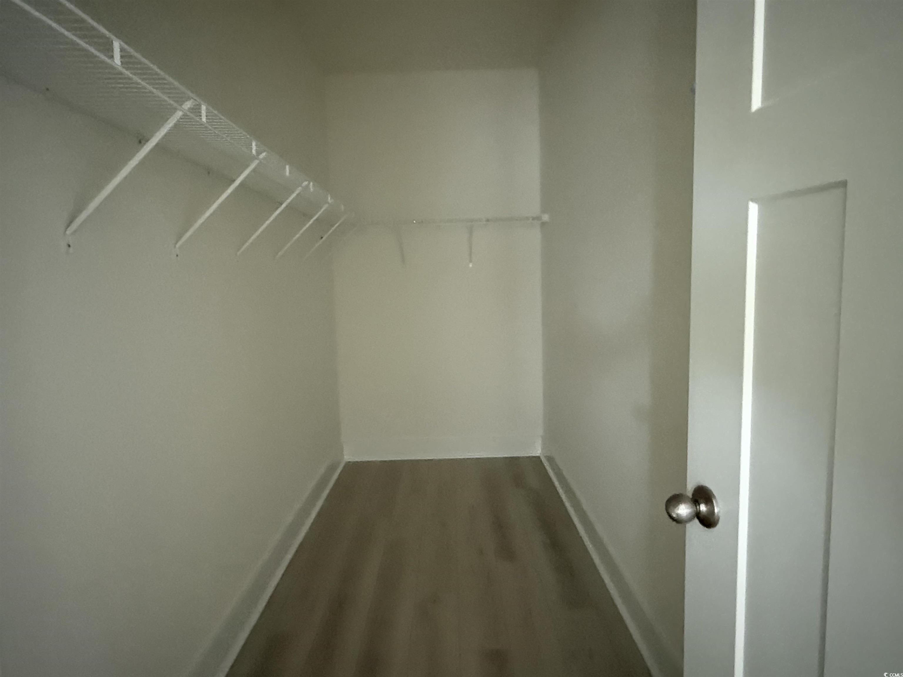 1045 Jase Drive Longs, SC 29568 - Photo 17 of 33 Spacious closet featuring dark wood-style floors