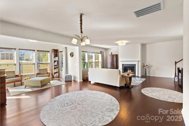 a living room with furniture and a table