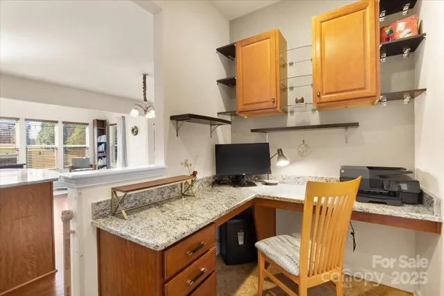 a kitchen with stainless steel appliances granite countertop a stove and a sink