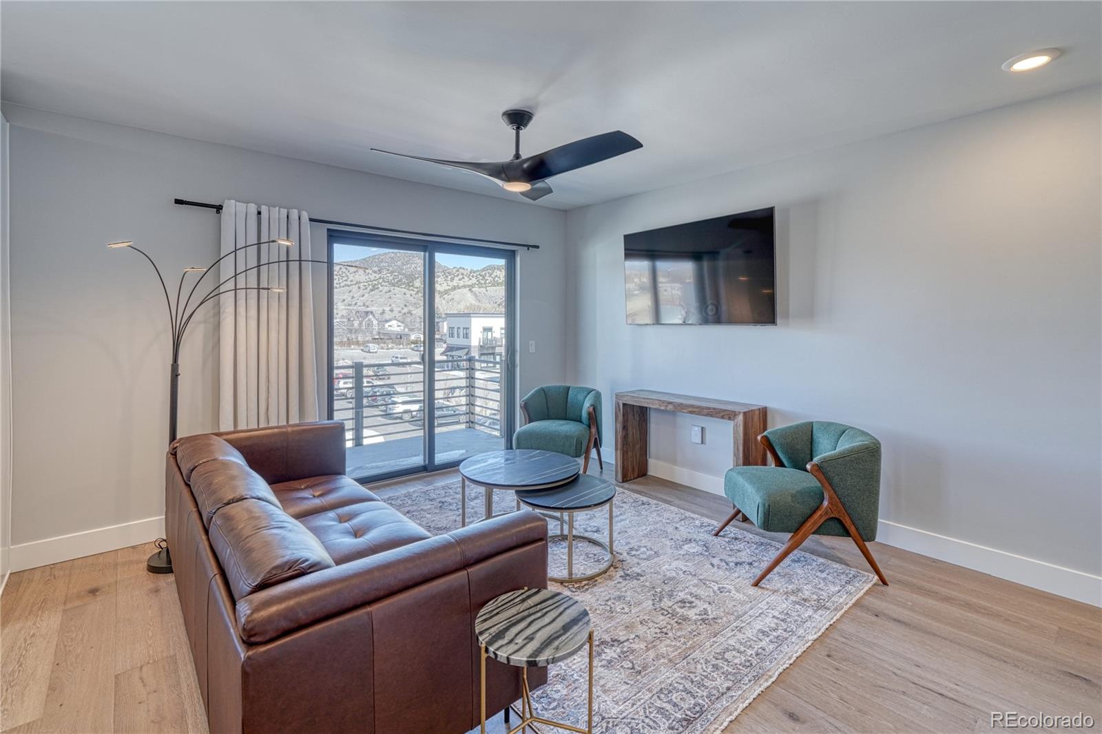 136 Old Stage Road, Unit 1E Salida, CO 81201 - Photo 17 of 26 a living room with furniture and a window