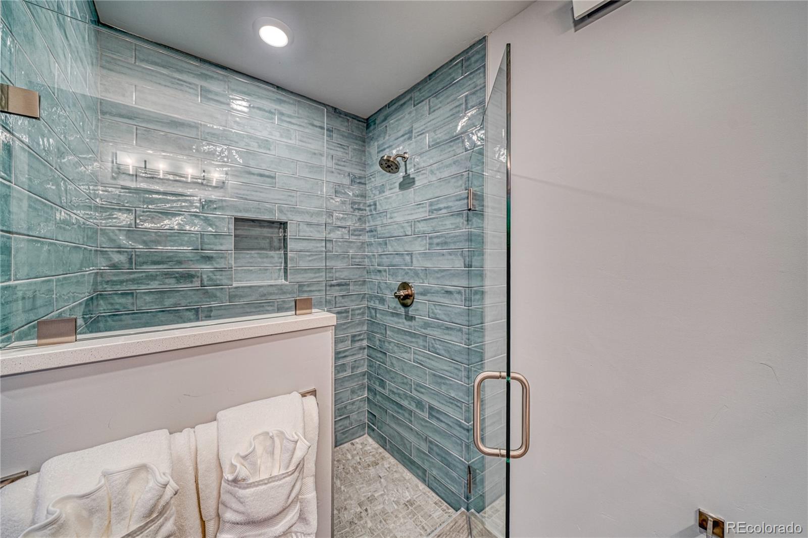 136 Old Stage Road, Unit 1E Salida, CO 81201 - Photo 21 of 26 a bathroom with a shower and a sink