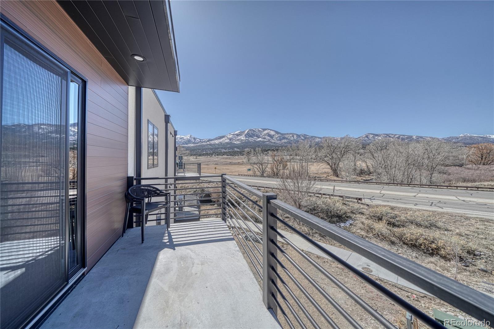 136 Old Stage Road, Unit 1E Salida, CO 81201 - Photo 6 of 26 a view of a back yard from a balcony
