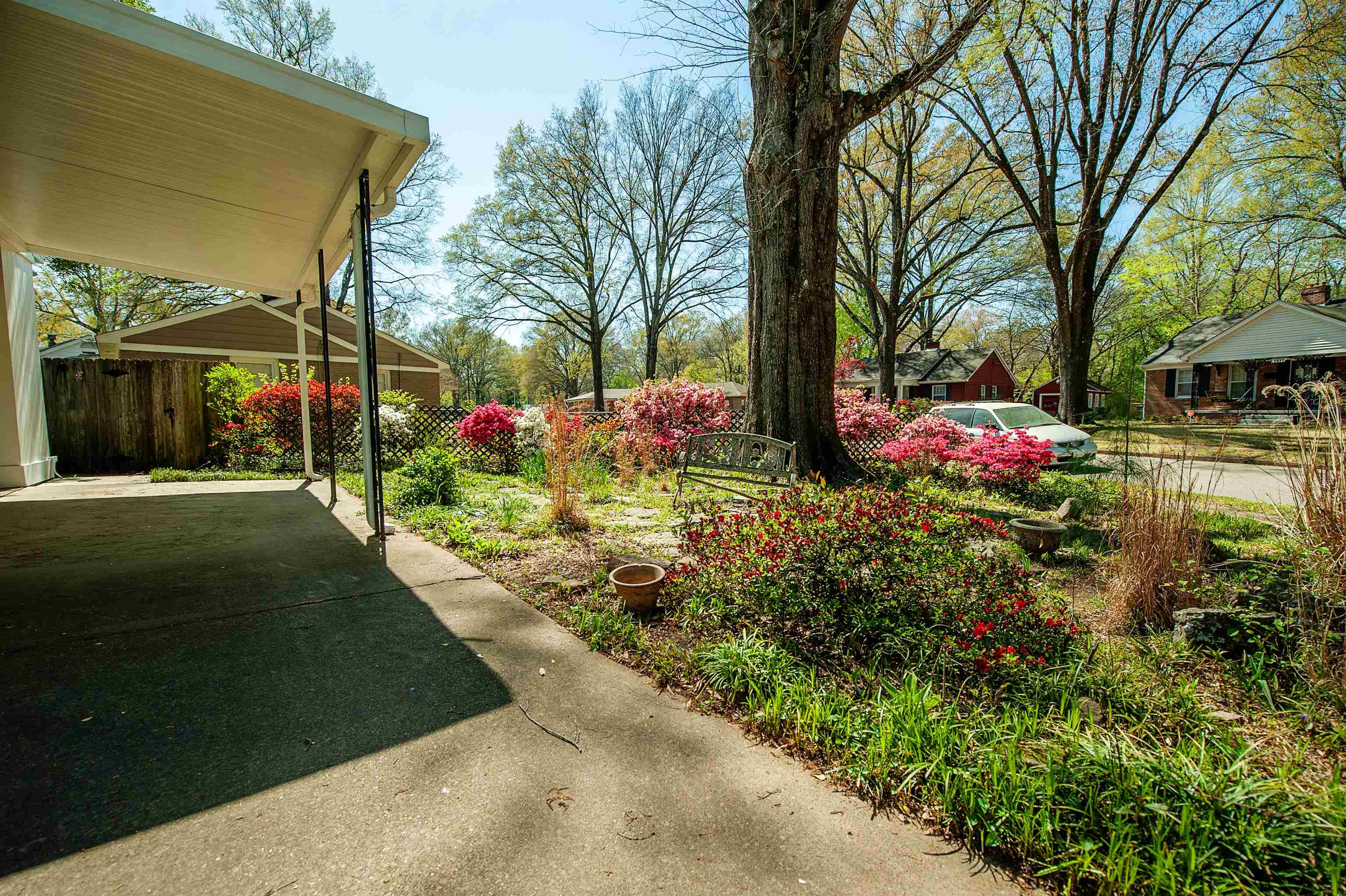 1015 South Perkins Road Memphis, TN 38117 - Photo 21 of 21 a front view of a house with garden