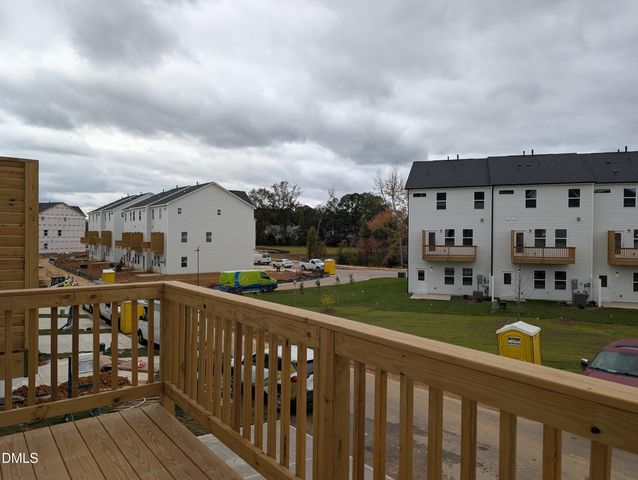 a view of a swimming pool with a deck
