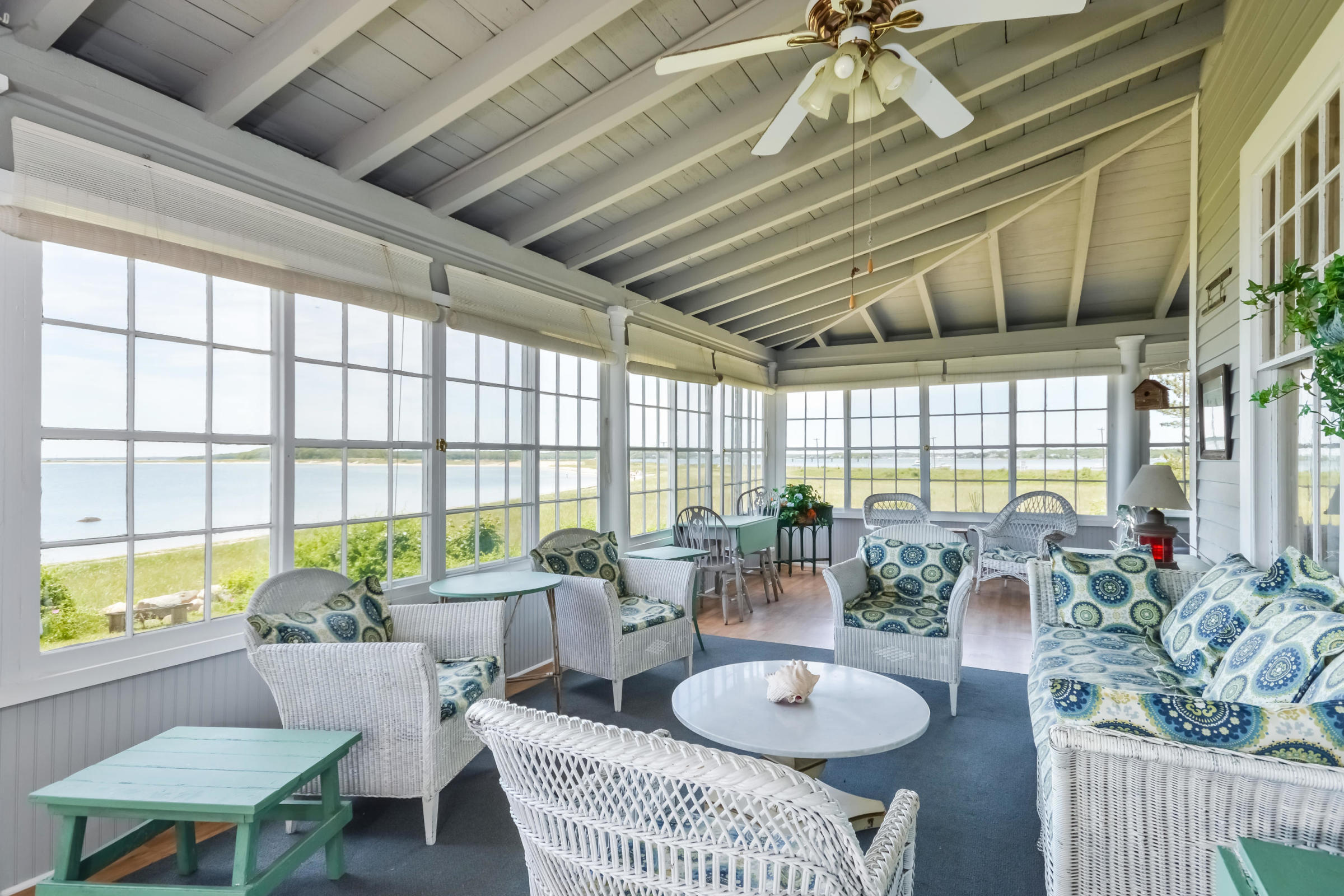 96 Rocky Point Road Bourne, MA 02532 - Photo 17 of 28 a living room with furniture and a large window