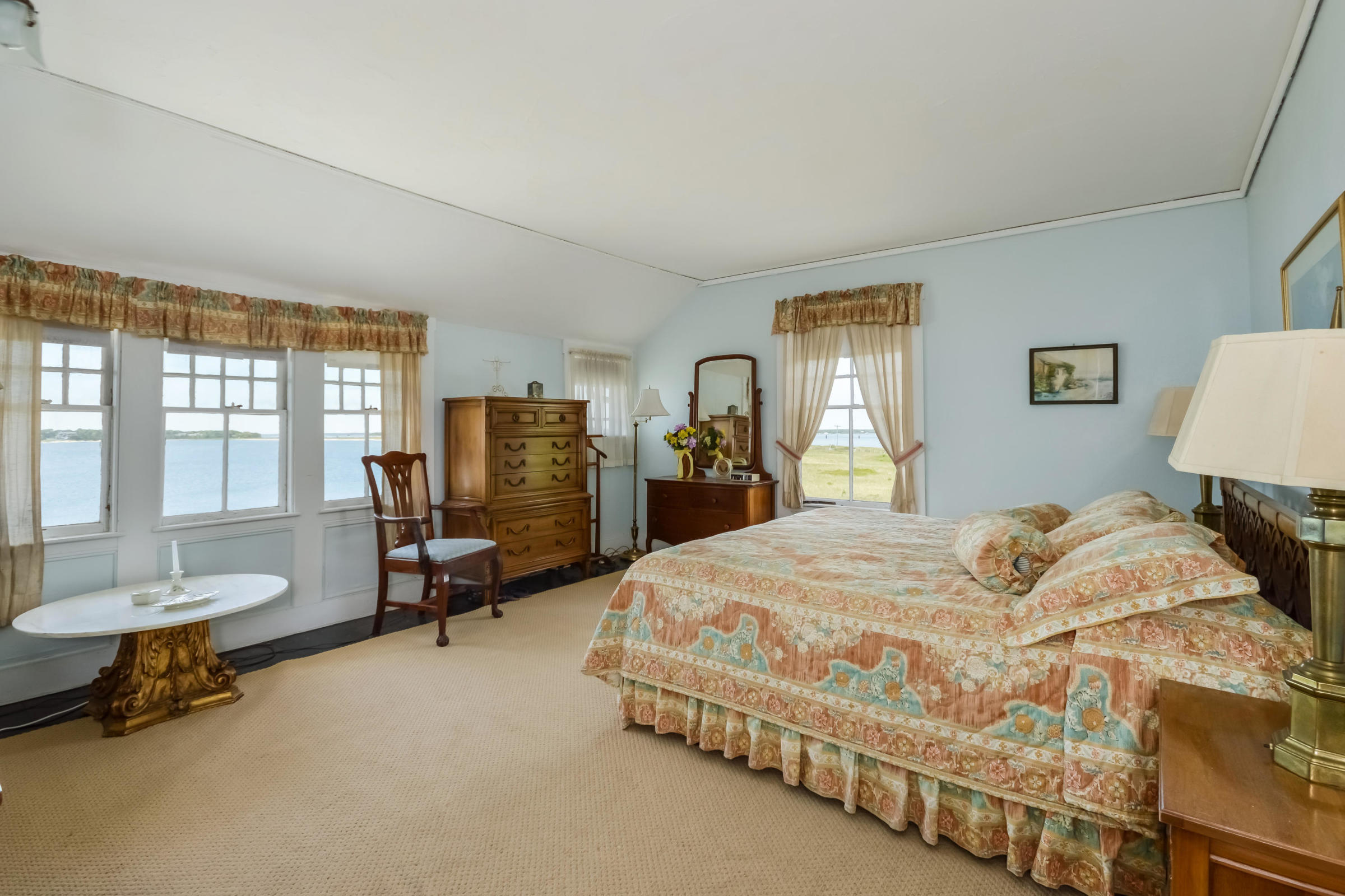 96 Rocky Point Road Bourne, MA 02532 - Photo 20 of 28 a bedroom with a bed and furniture