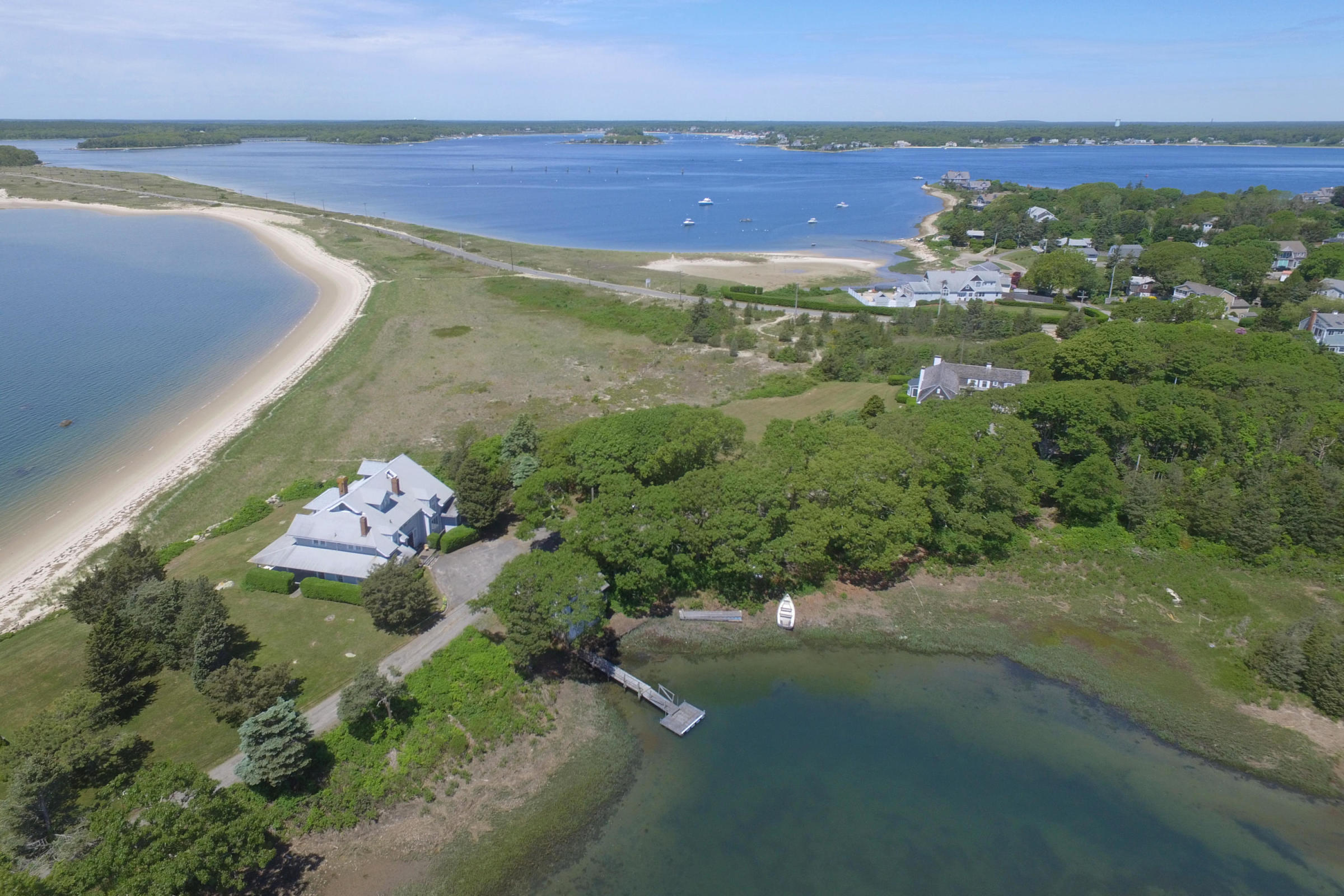 96 Rocky Point Road Bourne, MA 02532 - Photo 2 of 28 a view of a lake with a mountain