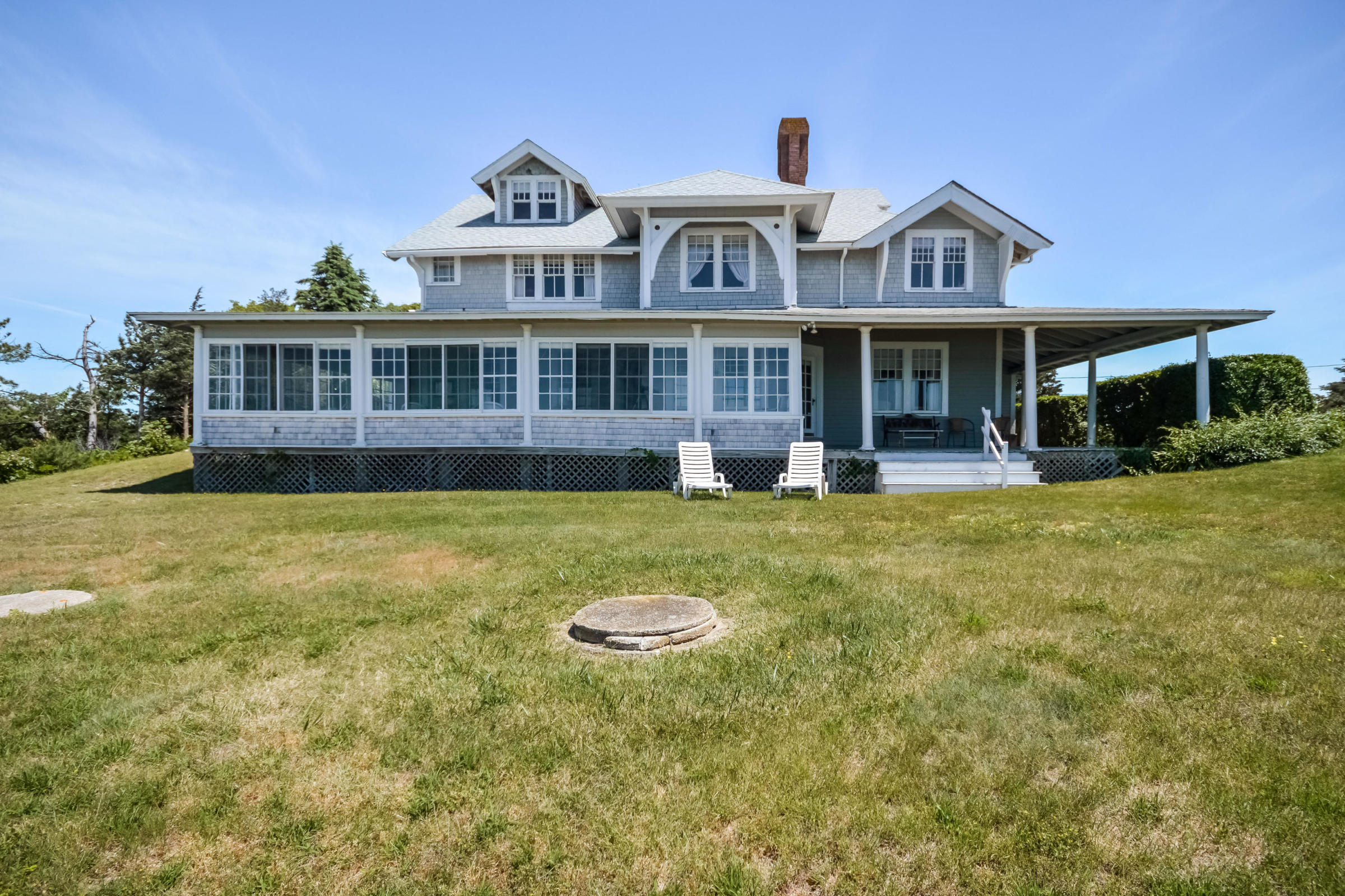 96 Rocky Point Road Bourne, MA 02532 - Photo 24 of 28 a front view of a house with a yard