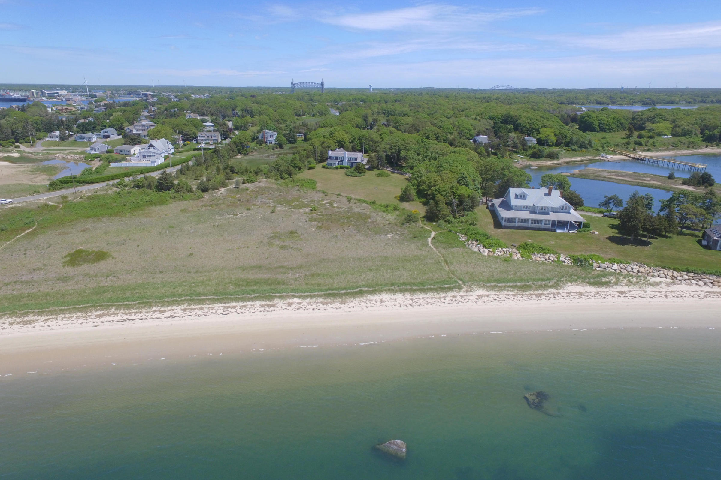 96 Rocky Point Road Bourne, MA 02532 - Photo 4 of 28 a view of a lake with a city