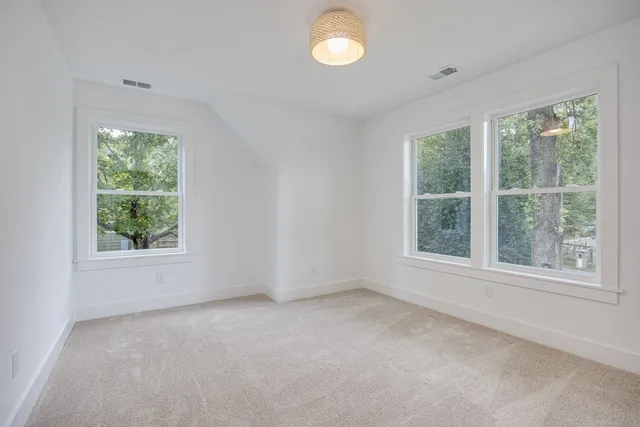 a balcony view with a lake view