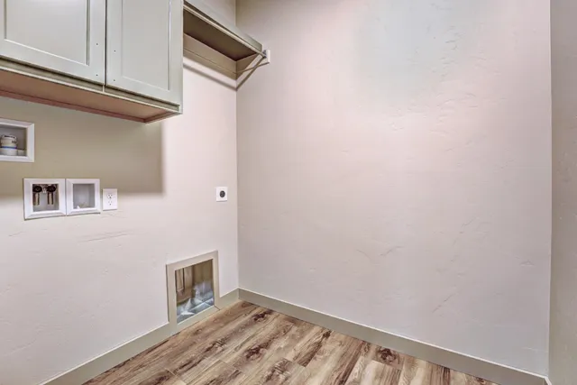 a view of small space with wooden floor