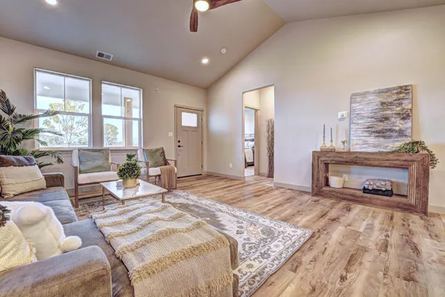 a bedroom with a bed and a fireplace