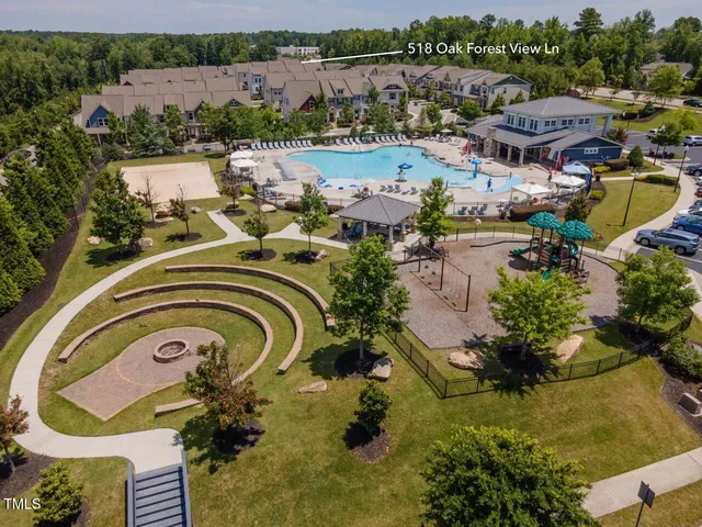 an aerial view of a house with a ocean view