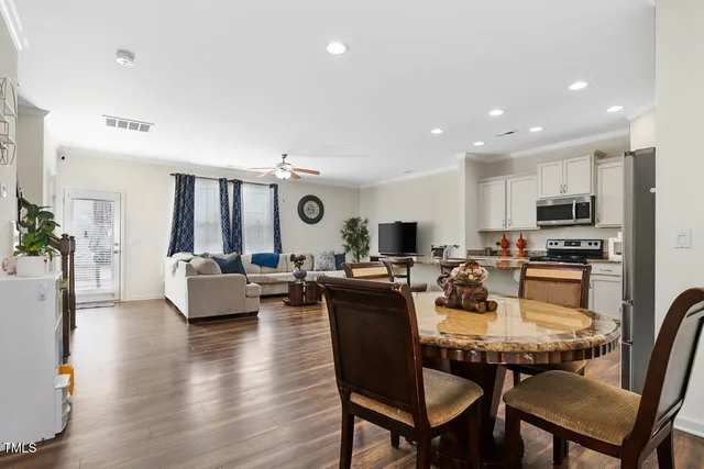 a view of a dining room with furniture