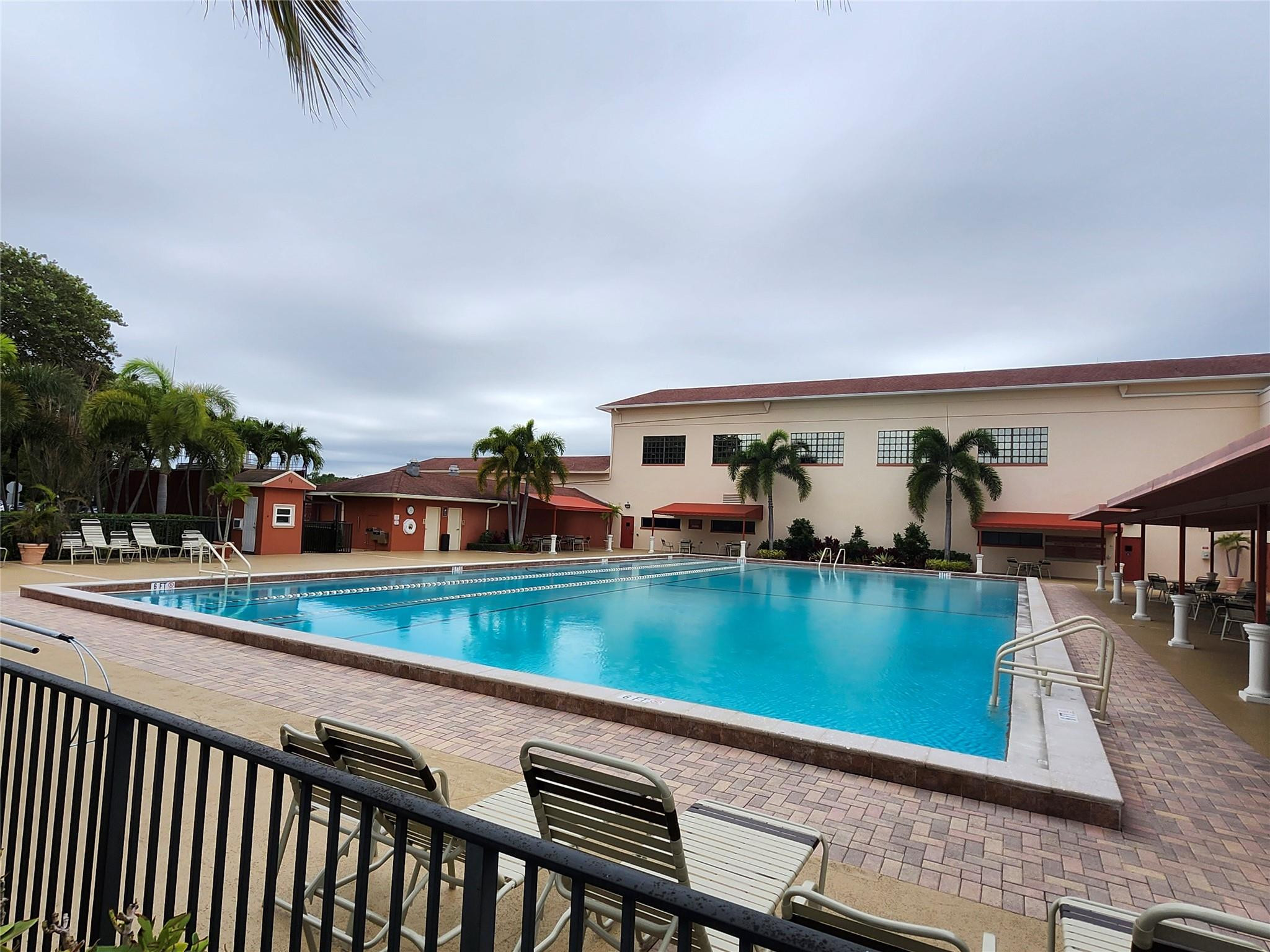 74 Preston Way Boca Raton, FL 33434 - Photo 25 of 28 swimming pool view with a seating space