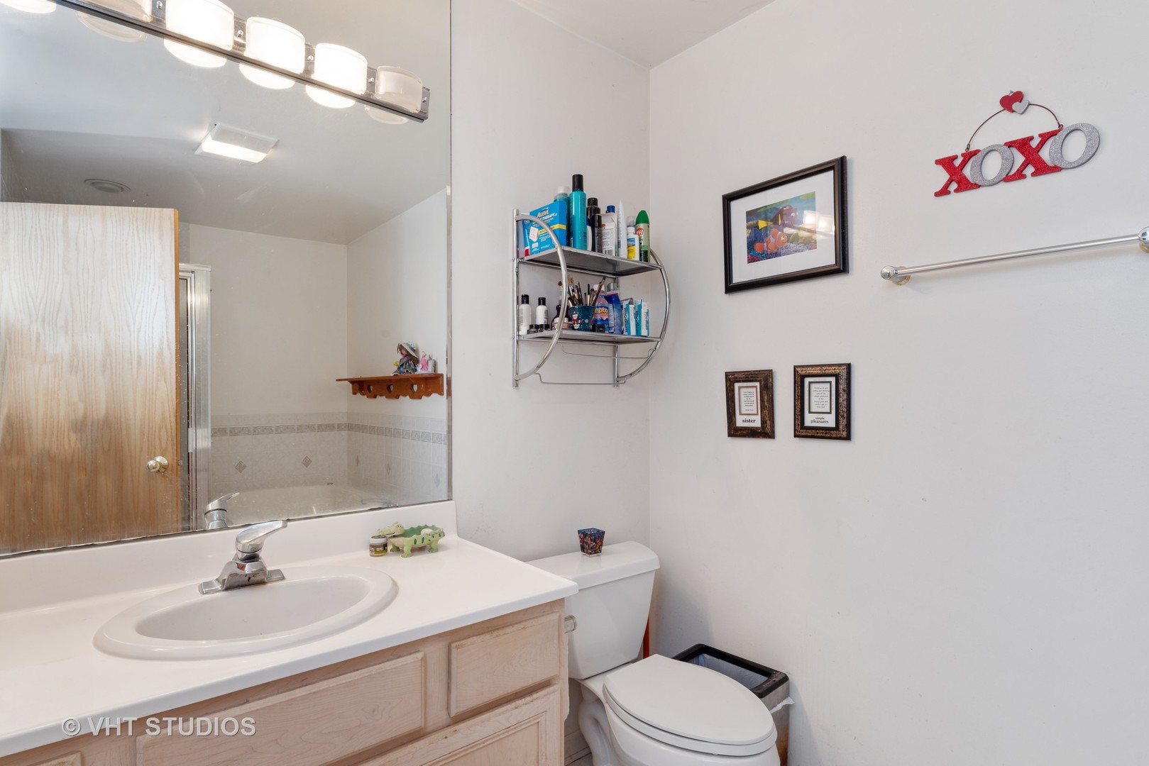 540 Briarhill Road Glenview, IL 60025 - Photo 11 of 19 a bathroom with a sink mirror and toilet