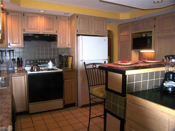 15 Bellevue Road Andover, MA 01810 - Photo 12 of 30 a kitchen with a stove a sink and a microwave