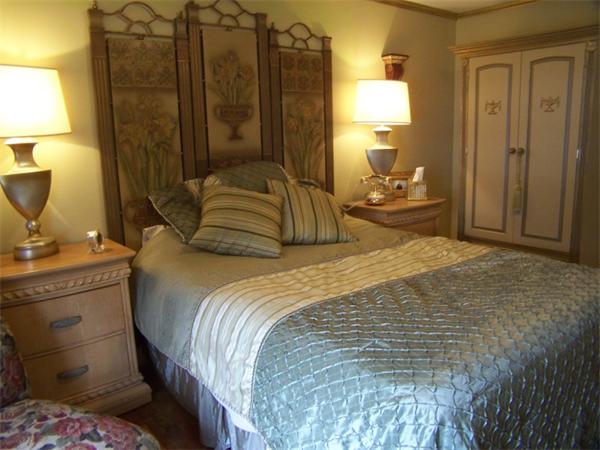 15 Bellevue Road Andover, MA 01810 - Photo 15 of 30 a bedroom with a bed and a lamp on table
