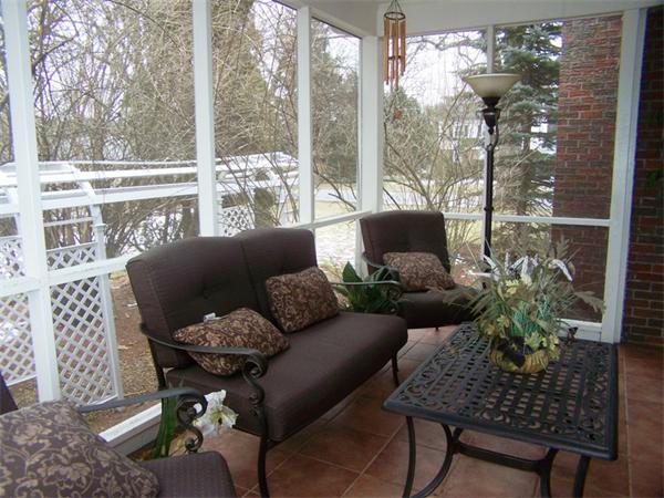 15 Bellevue Road Andover, MA 01810 - Photo 23 of 30 a living room with furniture and a floor to ceiling window