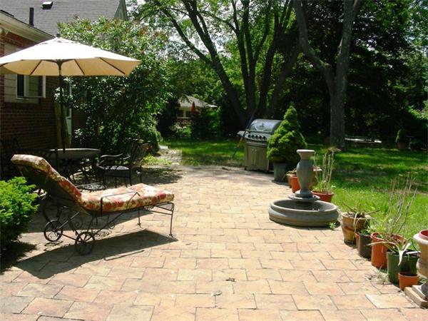 15 Bellevue Road Andover, MA 01810 - Photo 26 of 30 a view of a backyard with plants and a garden