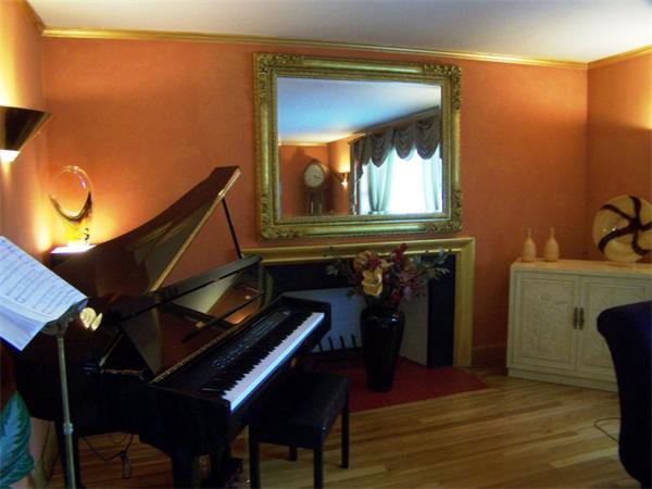 15 Bellevue Road Andover, MA 01810 - Photo 6 of 30 a view of a livingroom with furniture and a fireplace