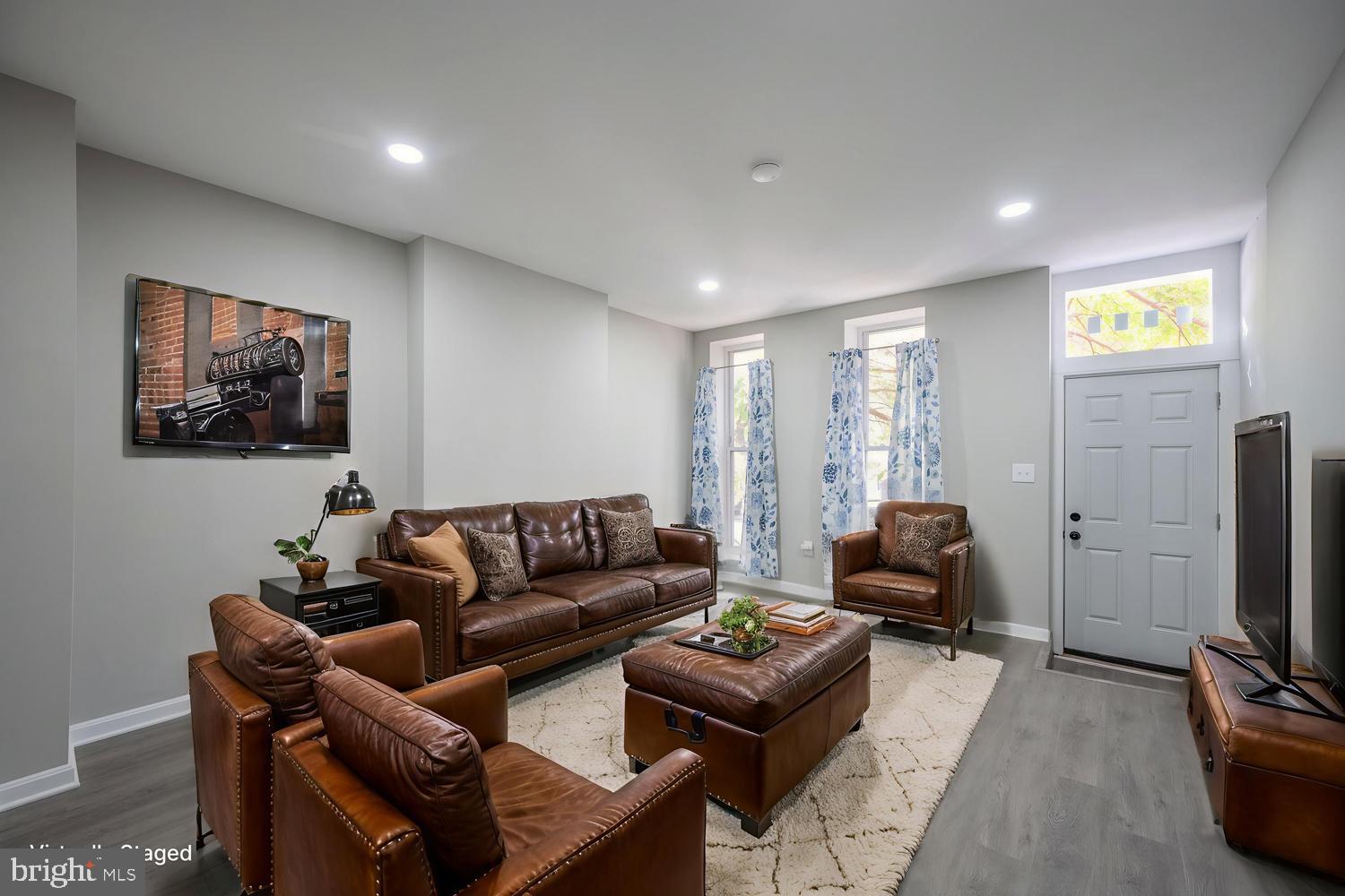 1823 North Caroline Street Baltimore, MD 21213 - Photo 5 of 17 Living Room staged