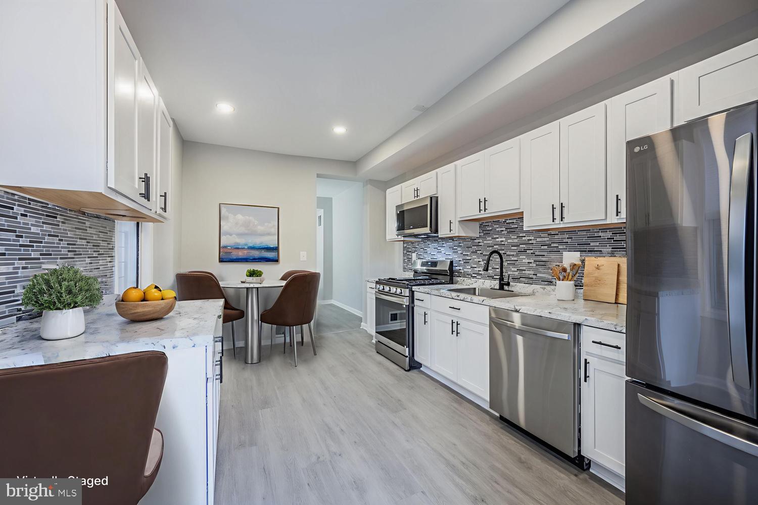 1823 North Caroline Street Baltimore, MD 21213 - Photo 6 of 17 Kitchen staged