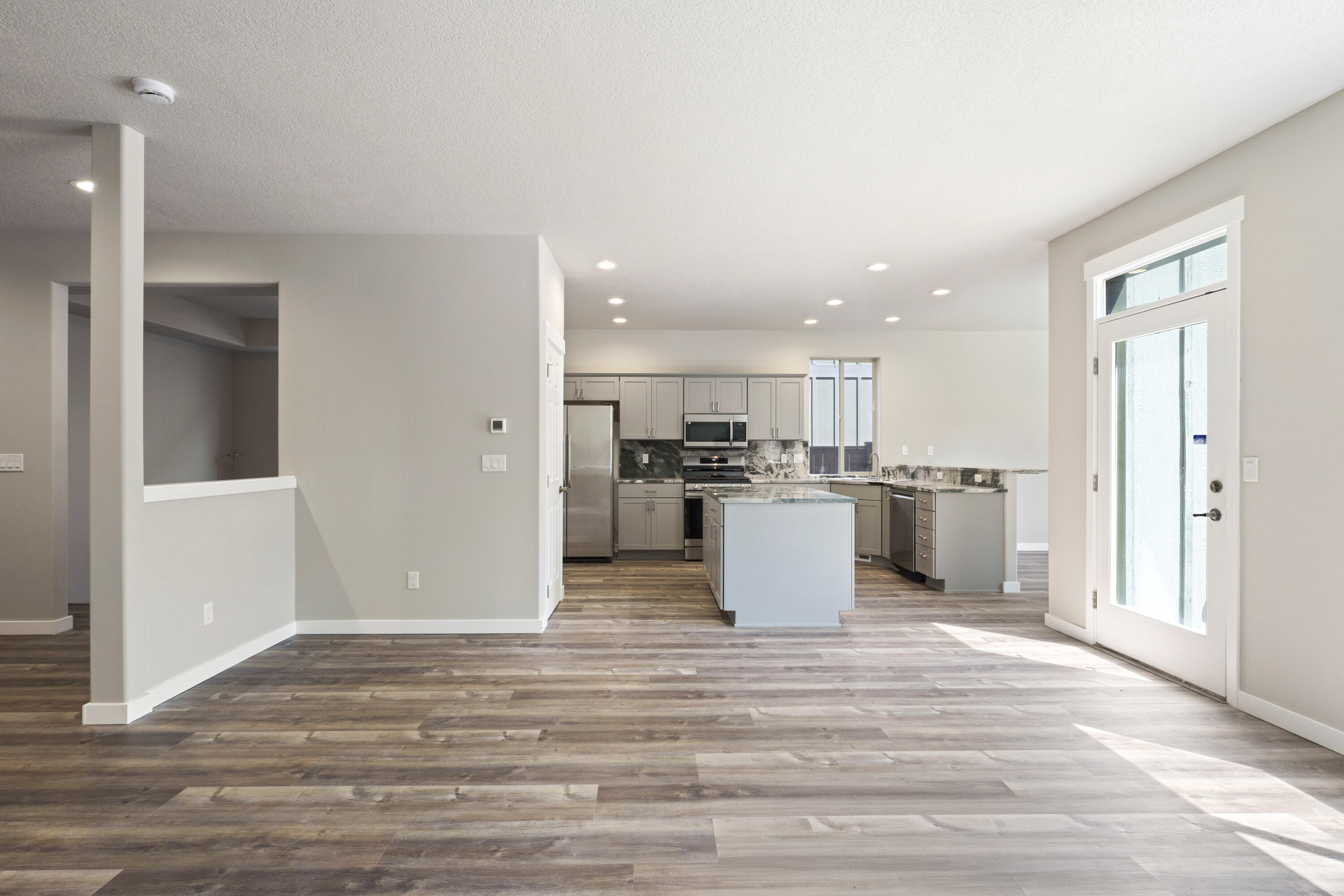 21189 Ritz Place Bend, OR 97702 - Photo 9 of 37 a view of kitchen with wooden floor