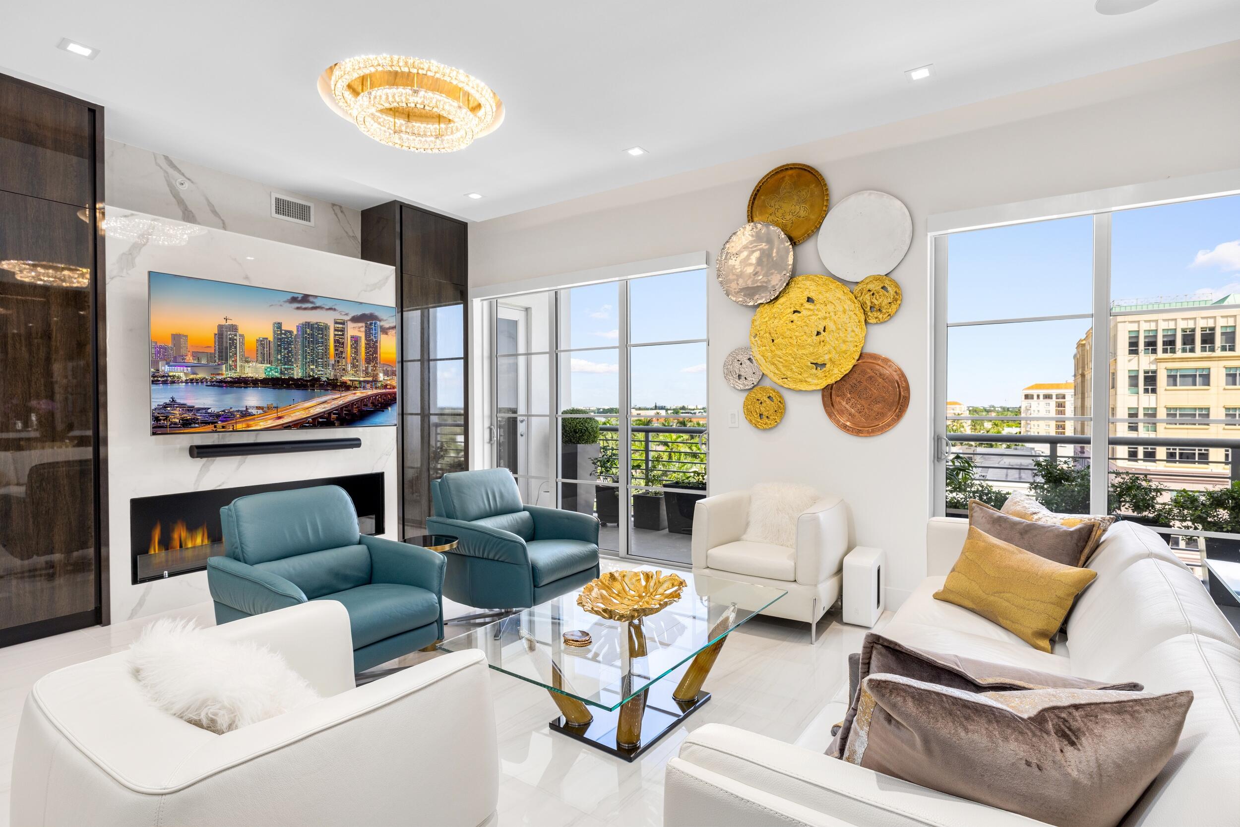 a living room with fireplace furniture and a flat screen tv
