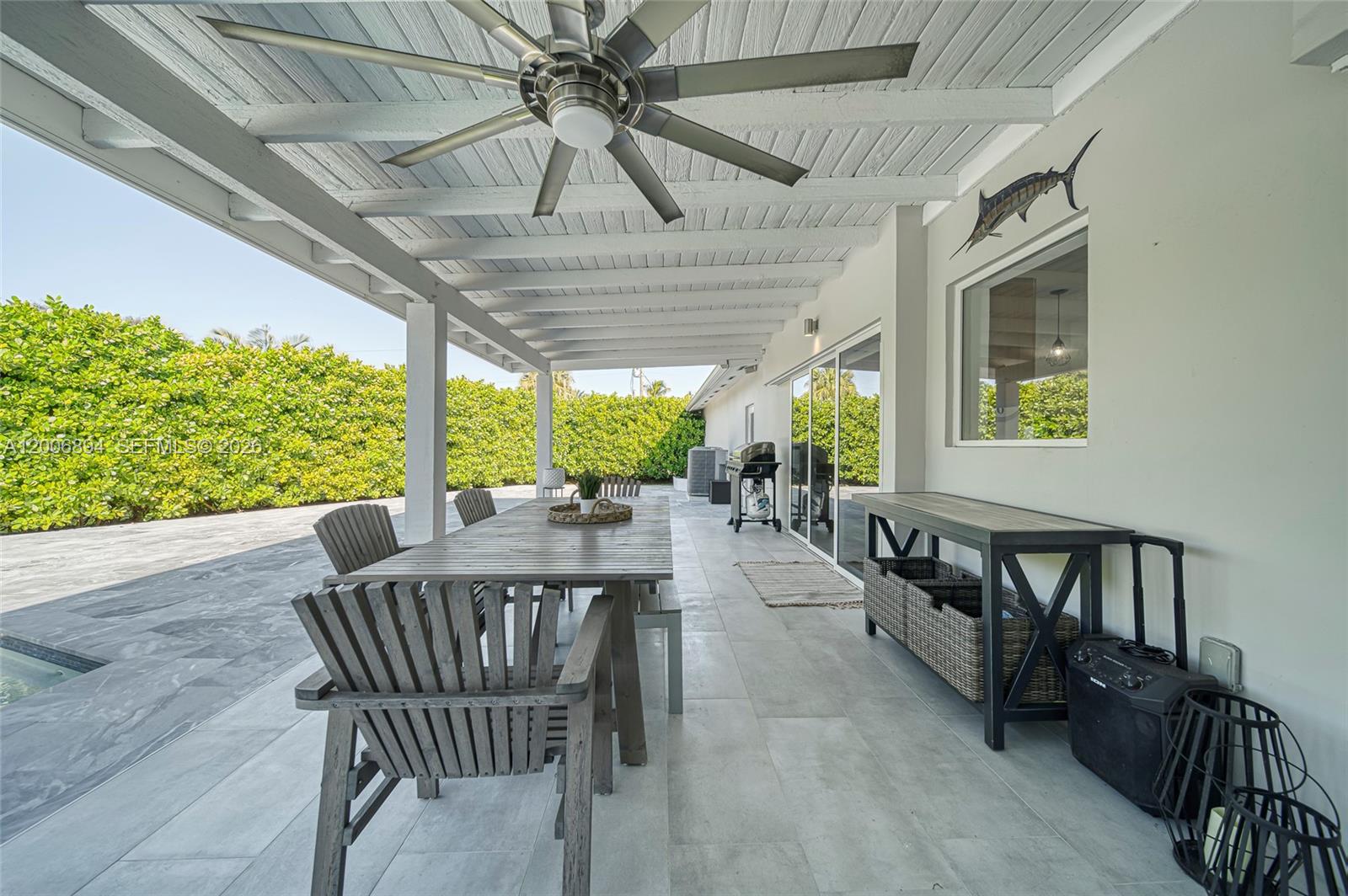 10600 Southwest 80th Court Miami, FL 33156 - Photo 31 of 51 a view of a patio on the roof deck