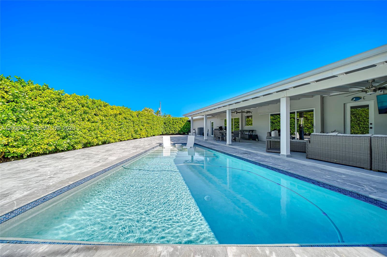 10600 Southwest 80th Court Miami, FL 33156 - Photo 35 of 51 a view of a house with a backyard
