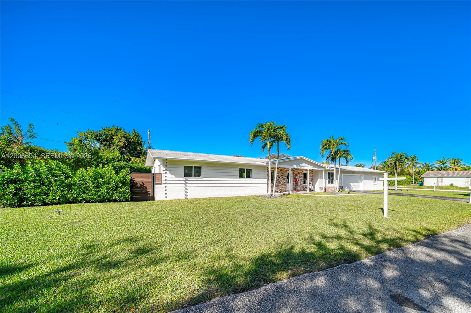 10600 Southwest 80th Court Miami, FL 33156 - Photo 40 of 51 a view of a house with a yard