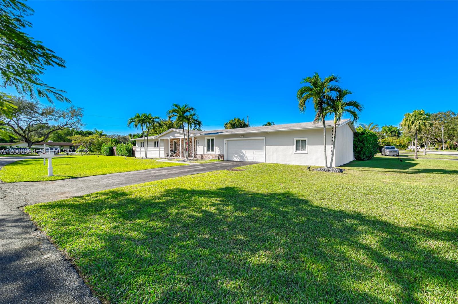 10600 Southwest 80th Court Miami, FL 33156 - Photo 41 of 51 a house view with a garden space