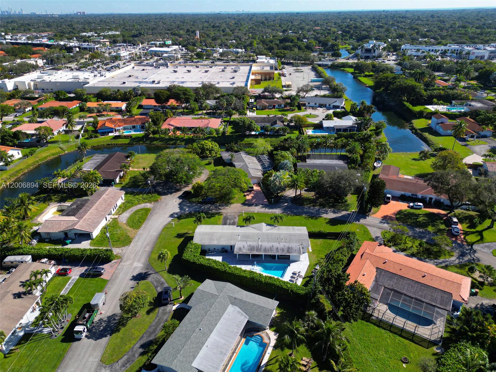 10600 Southwest 80th Court Miami, FL 33156 - Photo 49 of 51 an aerial view of a houses with a swimming pool yard and outdoor seating
