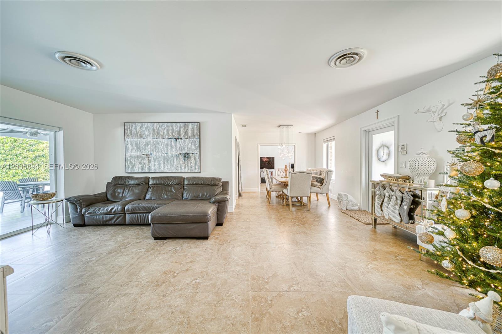 10600 Southwest 80th Court Miami, FL 33156 - Photo 6 of 51 a living room with furniture and wooden floor