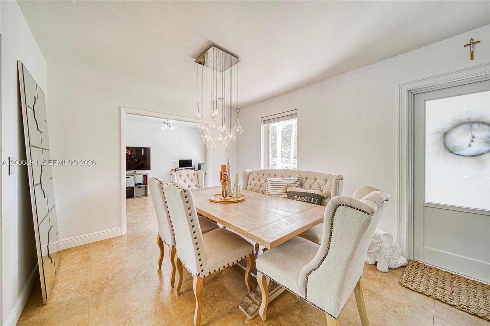 10600 Southwest 80th Court Miami, FL 33156 - Photo 7 of 51 a view of a dining room with furniture