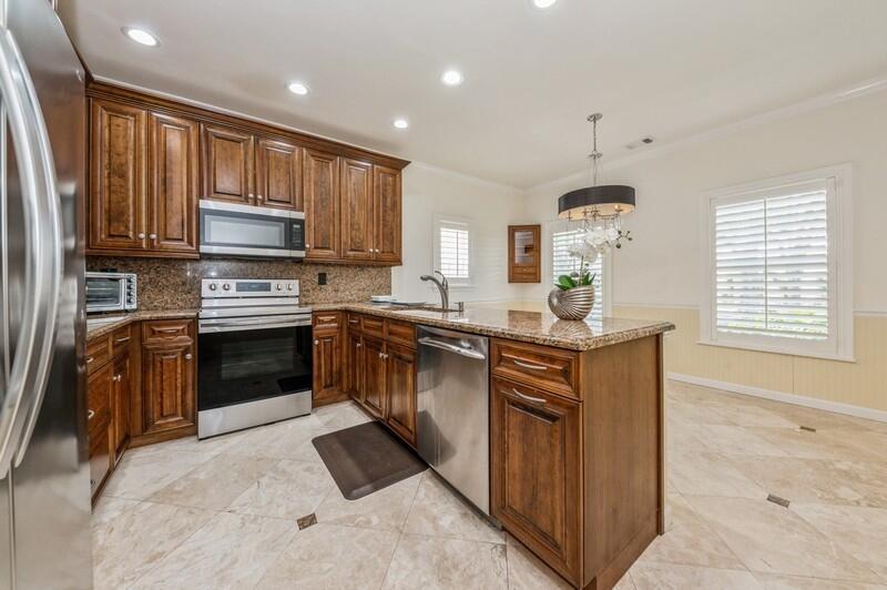 5871 Michaux Street Boca Raton, FL 33433 - Photo 5 of 28 07_5871Michaux_191_KitchenBreakfastRoom_