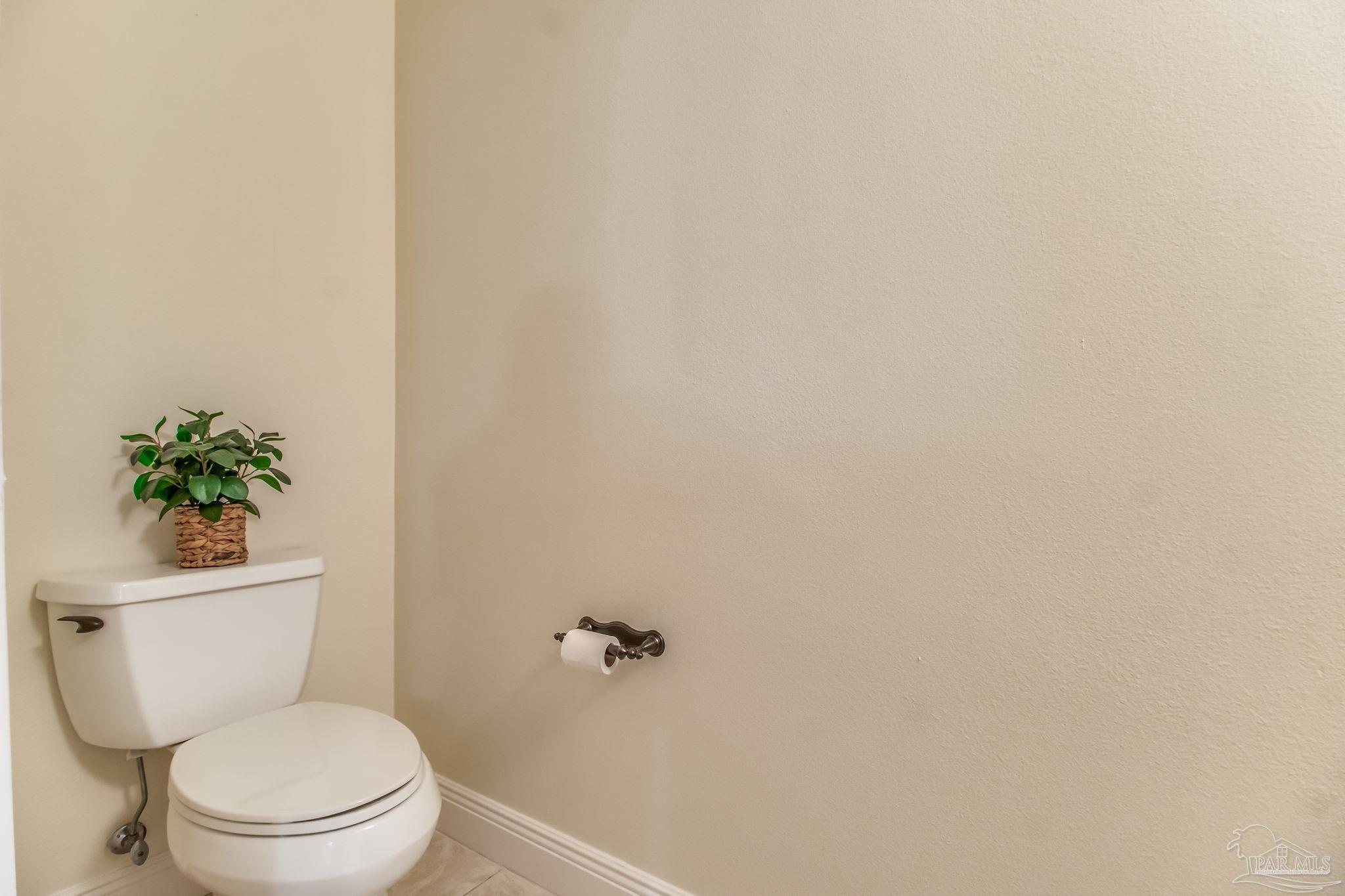 14500 River Road, Unit 406 Pensacola, FL 32507 - Photo 29 of 45 a white toilet sitting next to a white sink