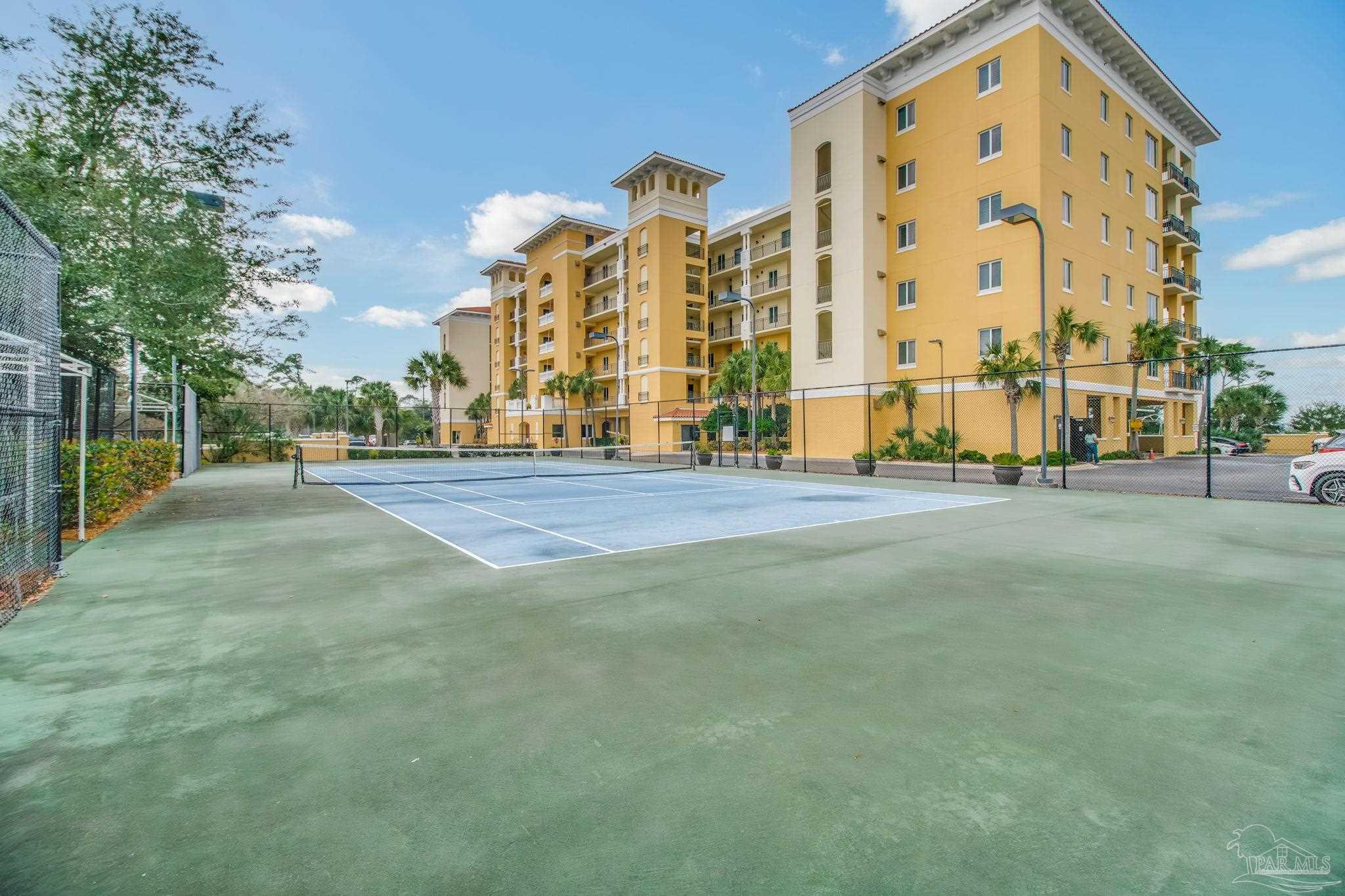 14500 River Road, Unit 406 Pensacola, FL 32507 - Photo 33 of 45 a view of tall building with large trees