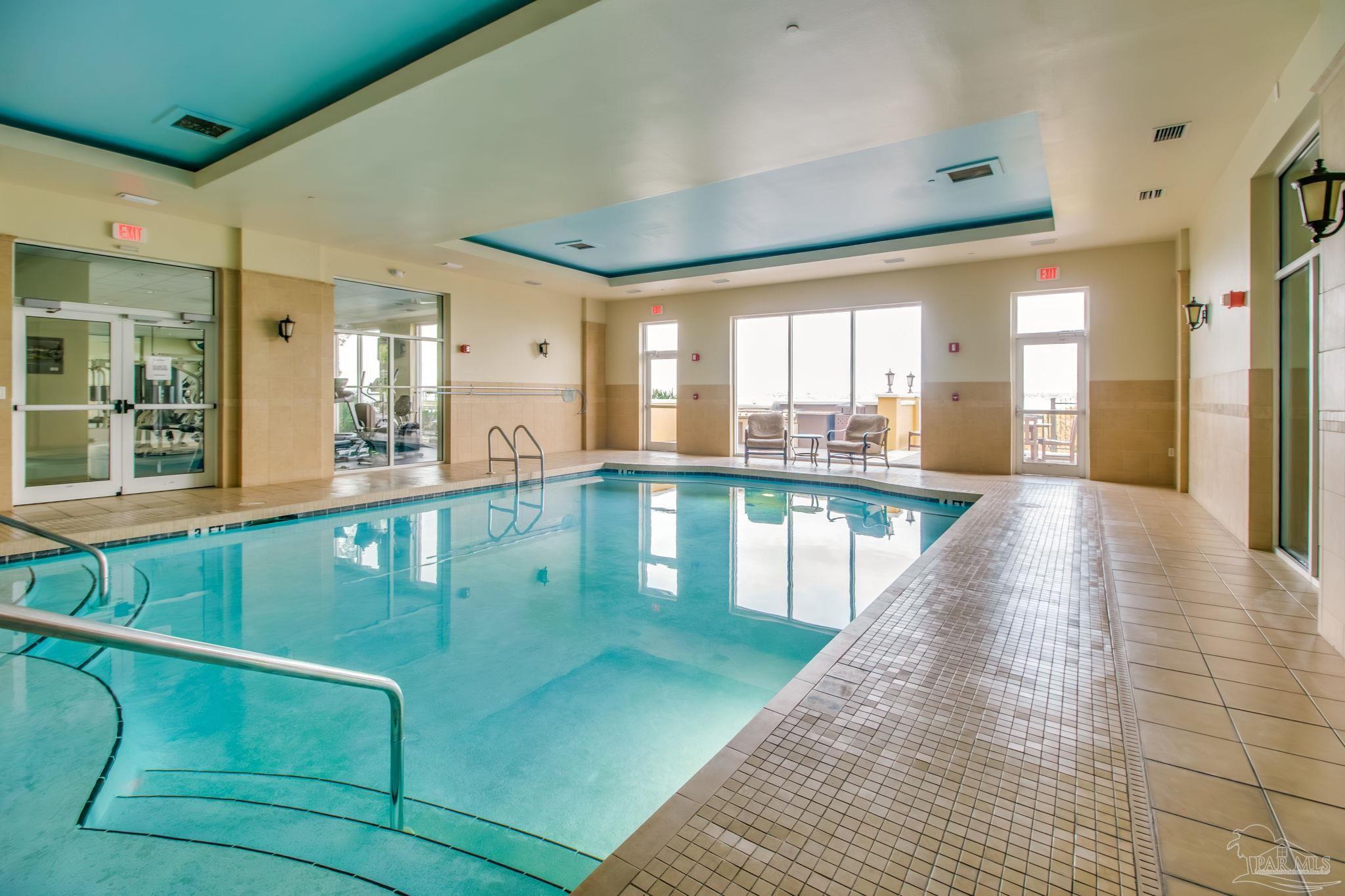 14500 River Road, Unit 406 Pensacola, FL 32507 - Photo 34 of 45 a lobby with a chandelier