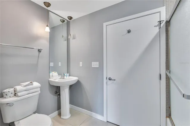 a view of a house with backyard from a balcony